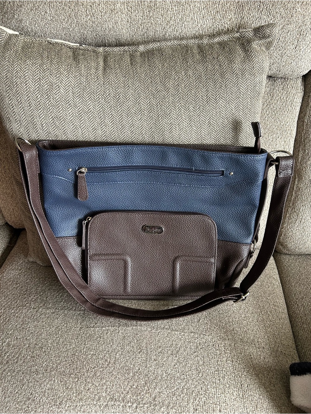 B. Amici Serena RFID Pebble Navy Blue/Chocolate Crossbody Bucket Bag